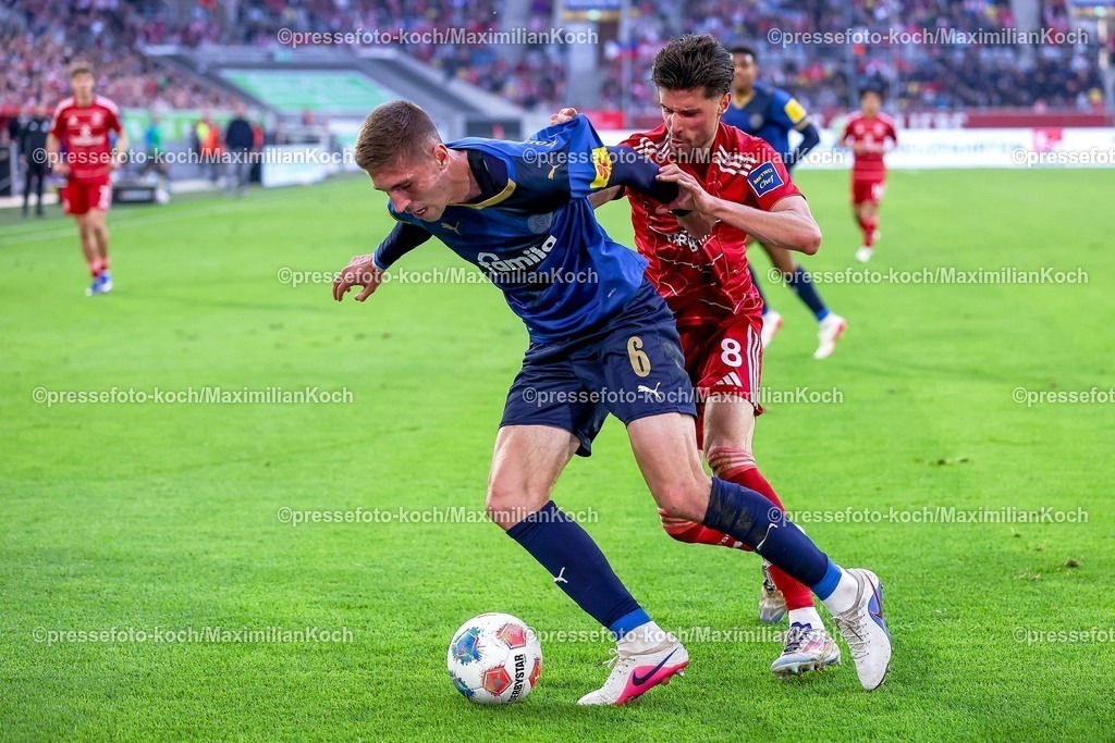F9510042601039 | 10.04.2026, Fußball, Fortuna Düsseldorf - Holstein Kiel, 2. Fußball Bundesliga, Herren, Merkur Spiel-Arena, 29. Spieltag, Saison 2025 2026: Marko Ivezic&nbsp; (Holstein Kiel #06)  im Zweikampf gegen  Anouar El Azzouzi&nbsp;(Fortuna Düsseldorf #08)  DFB regulations prohibit any use of photographs as image sequences and or quasi-video.