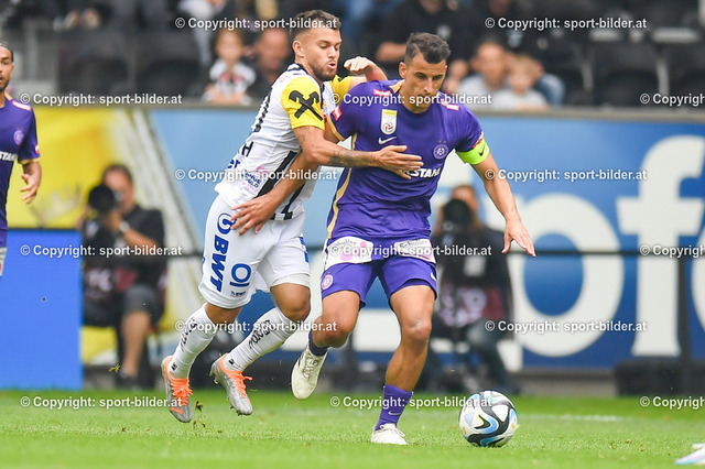 AUT, Admiral Bundesliga, LASK Linz vs FK Austria Wien | 27.08.2023, Raiffeisen Arena Linz, AUT, Admiral Bundesliga, LASK Linz vs FK Austria Wien, im Bild Sascha Horvath (Lask) vs Manfred Fischer (Austria Wien)


// Admiral Bundesliga Match between LASK Linz and FK Austria Wien in Linz, Austria on 2023/08/27
