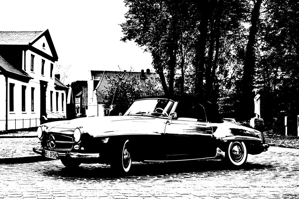 Mercedes 190 SL Roadster | Der Mercedes 190 SL Roadster der Baureihe W 121 B II wurde zwischen 1955 und 1963 gebaut. Den Hintergrund für dieses schöne Auto bilden Häuser am Nordermarkt in der Kleinstadt Meldorf. - Realisiert mit Pictrs.com