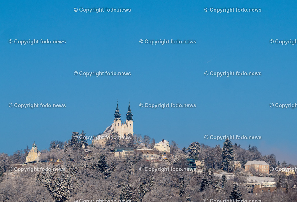 Poestlingberg_ Wallfahrtsbasilika_ 11.01.2026-2 | 11.01.2026, LINZ, AUT, Poestlingbergkirche, Wallfahrtsbasilika, Wahrzeichen, Linz, im Bild Poestlingberg, Kirche, Berg, Schnee, Winter, Wintersonne, Sonne, Himmel, Turm, Tuerme, Ausflugsziel, Gebaeude