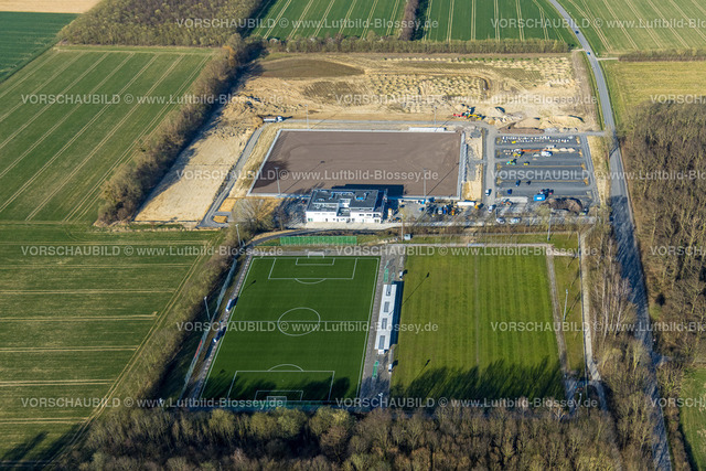 Hamm220304134 | Luftbild, Baustelle und Neubau Sportplatz mit Tribünen sowie ein Vereinsgebäude mit Sport-Kindertagesstätte Rabatz Am Berg, An der Lohschule im Stadtteil Rhynern in Hamm, Ruhrgebiet, Nordrhein-Westfalen, Deutschland