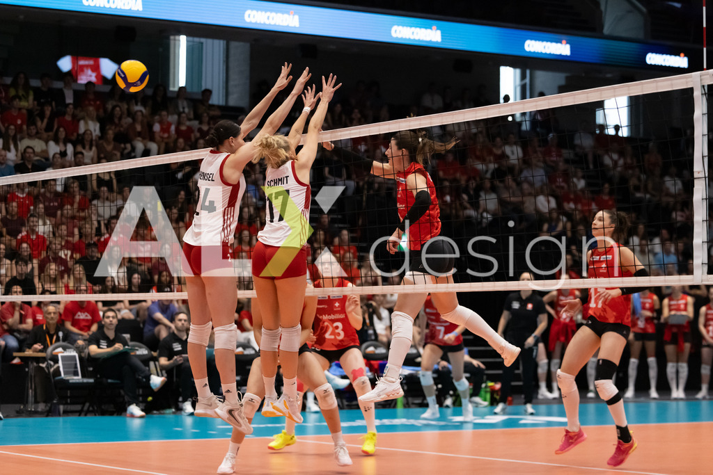 Austria v Switzerland - CEV European League Women | KRIENS, SWITZERLAND - JUNE 14: SARINA WIELAND of Switzerland attack / spike against DAGMAR HENSEL and DANA SCHMIT of Austria double block during the CEV European League match between Austria and Switzerland at Pilatus Arena on June 14, 2026 in Kriens, Switzerland. - Realisiert mit Pictrs.com