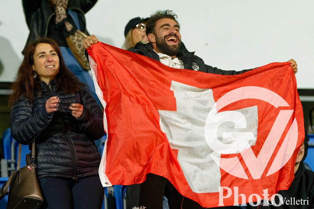 UEFA Region's Cup - Vaud v Munster | Supporters of Vaud with flags/banner during the UEFA Region's Cup game between Vaud and Munster at Centre Sportif de Colovray in Nyon, Switzerland 