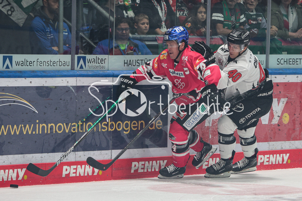Augsburger Panther - Koelner Haie  | Thomas Jordan TREVELYAN (AEV #24) im Duell mit Julian CHROBOT (KEC #40)