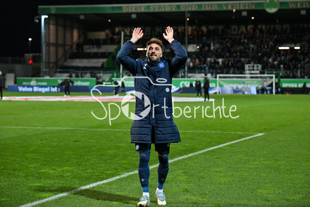 SpVgg Greuther Fürth - Karlsruher SC | FUERTH, GERMANY - OCTOBER 24: the team of Karsluhe - Fabian SCHLEUSENER (Karlsruher SC 24) his birthday - celebtrating with the fans after the 2. bundesliga match between SpVgg Greuther Fuerth vs. Karlsruher SC on matchday 10 at Sportpark Ronhof Thomas Sommer on October 24, 2025 in Fuerth, Germany / DFL REGULATIONS PROHIBIT ANY USE OF PHOTOGRAPHS AS IMAGE SEQUENCES AND/OR QUASI-VIDEO