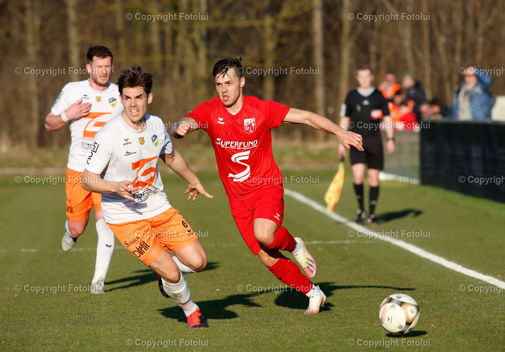 A_LUI_18032023_22 | SPORT,FUSSBALL,LT1 OOE LIGA ASKOE OEDT-SPG WALLERN/ST.MARIENKIRCHNEN 18.03.2023 IM BILD: MICHAEL LERCHER  (OEDT) UND JAKOB KARLINGER (SPGWALLERN) FOTO:FOTOLUI