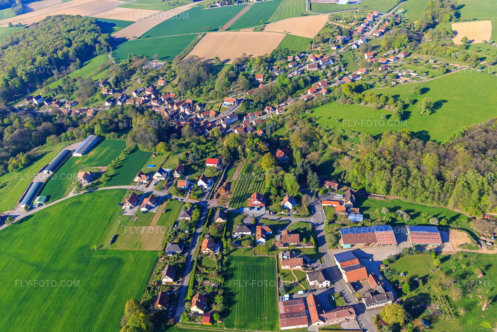 Aerial view: Rue Wolfsschenkel mit Ferme du Münzhof - Famille Pflug - Foin et viande bovine - Hay and beef in Drachenbronn-Birlenbach in the state Bas-Rhin, France.Photo: IMG_099319.jpg taken on 04/30/2017 by Werner Riehm/FLY-FOTO.comResolution of the original: 4658 x 3106 px