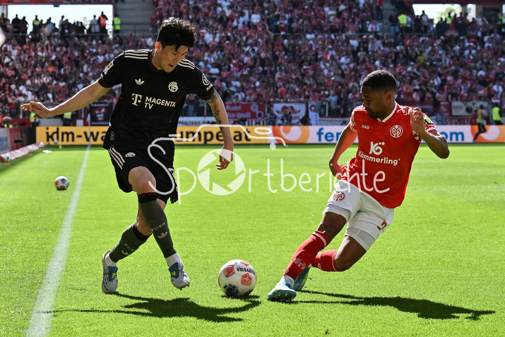 1. FSV Mainz 05 - FC Bayern München | MAINZ, GERMANY - 25. APRIL: im Duell Minjae KIM (FC Bayern Munich 3) und Phillipp MWENE (1. FSV Mainz 05 2) während dem Bundesligamatch zwischen dem 1. FSV Mainz 05 und dem FC Bayern München am 31. Spieltag in der MEWA Arena / DFL REGULATIONS PROHIBIT ANY USE OF PHOTOGRAPHS AS IMAGE SEQUENCES AND/OR QUASI-VIDEO