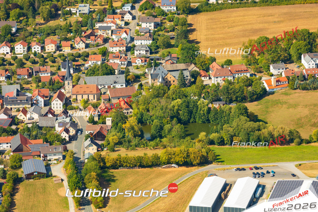 Klassische Luftaufnahme ohne Drohne zeigt:Schmölz bei Küps - Die Luftbildaufnahme wurde 2025 vom UL-Flugzeug heraus erstellt ( keine Drohne ) - Hochauflösende Luftaufnahme -Nicht vergleichbar mit Google Maps oder Satelittenbilder- Die Geschenkidee !Mit Lizenz und Bildrechte bestellbar