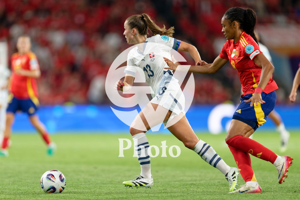 Spain v Switzerland - UEFA Women's EURO 2025 Quarter-Final | BERN, SWITZERLAND - JULY 18: Lia Walti of Switzerland  (L) runs with the ball under pressure from Salma Paralluelo of Spain (R) during the UEFA Women's EURO 2025 Quarter-Final match between Spain v Switzerland at Stadion Wankdorf on July 18, 2025 in Bern, Switzerland. (Photo by Giuseppe Velletri/Sports Press Photo/Getty Images)
