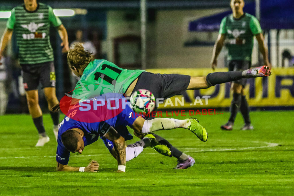 SAK Klagenfurt - VST Völkermarkt 4-5, Kärntner Liga 3. Runde | Zoran Vukovic (SAK Klagenfurt #24) Mario Kuester (VST Völkermark #11) SAK Klagenfurt - VST Völkermarkt 4-5 am 11.08.2023 in Klagenfurt
(SAK Sportpark), Austria, (Photo by Ernst Krawagner sport-fan.at) - Realisiert mit Pictrs.com