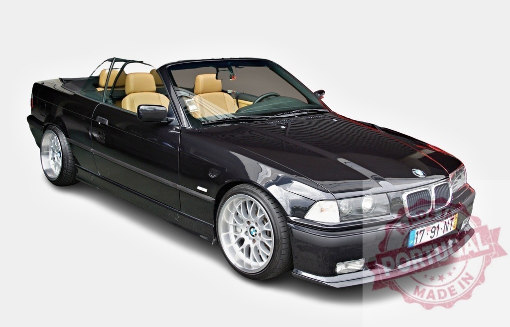 Classic BMW convertible exudes timeless style and sporty appeal | Stylish black BMW convertible parked, showcasing its elegant design and open-top freedom - Realized with Pictrs.com