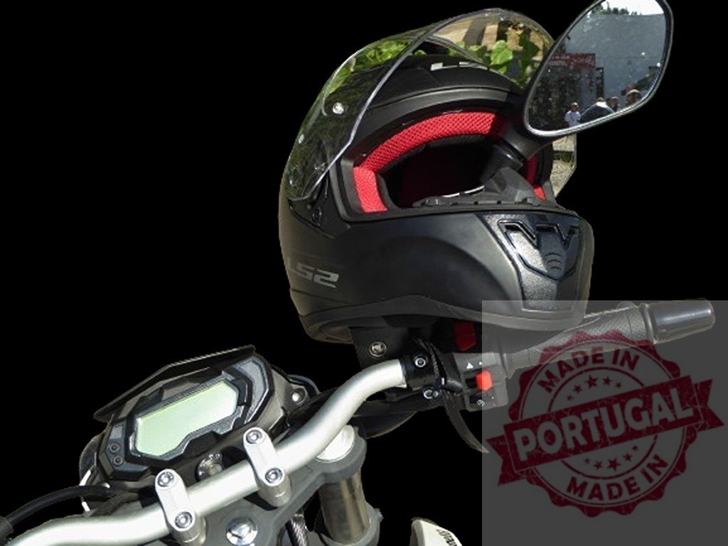 Black motorcycle helmet hanging on the handlebar, reflecting people in the mirror | Close-up of a black motorcycle helmet hanging on the handlebar with visible dashboard and rearview mirror reflecting people - Realized with Pictrs.com
