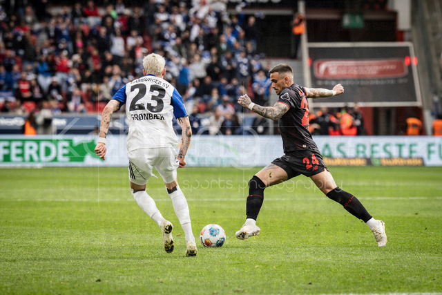 German Bundesliga, Bayer 04 Leverkusen vs. Hamburger SV, 16.05.2026 | LEVERKUSEN, GERMANY - MAY 16, 2026 :  Aleix Garcia (Bayer 04 Leverkusen, 24), Albert Gronbaek (Hamburger SV, 23) during the German Bundesliga match on gameday 34 between Bayer 04 Leverkusen vs. Hamburger SV at BayArena on May 16, 2026 in Leverkusen, Germany. DFL REGULATIONS PROHIBIT ANY USE OF PHOTOGRAPHS AS IMAGE SEQUENCES AND/OR QUASI-VIDEO.