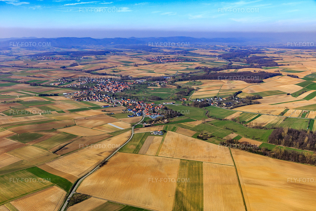 Aerial view: View of the town from the southwest in Hoffen in the state Bas-Rhin, France. – Photo: IMG_097442.jpg taken on 03/16/2017 by Werner Riehm/FLY-FOTO.com – Resolution of the original: 5472 x 3648 px
