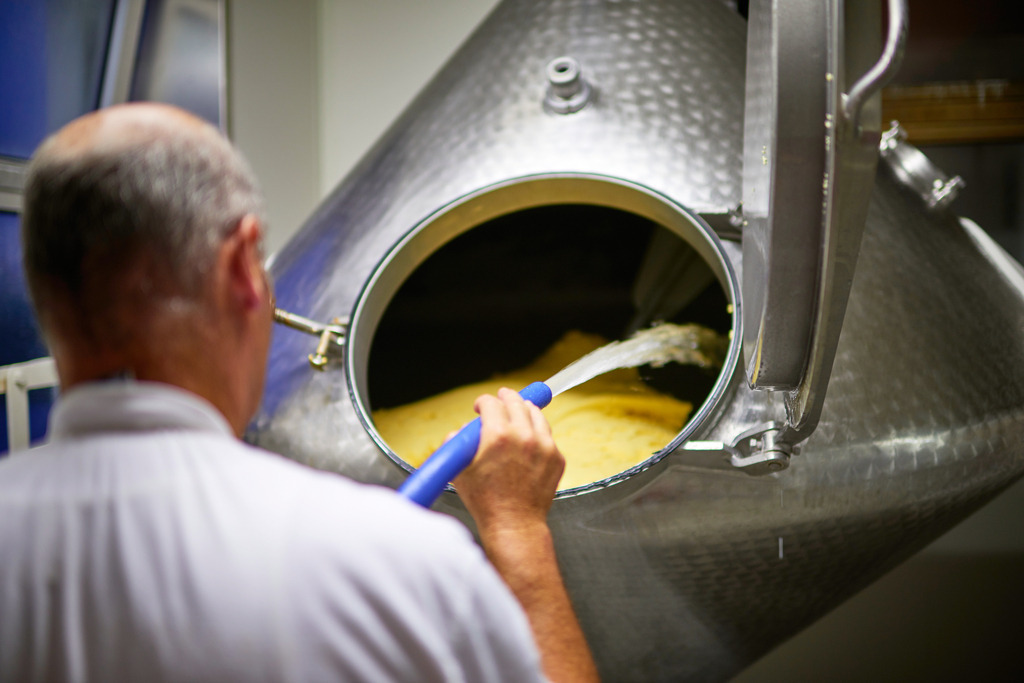 Sennerei Hittisau | Hittisau, Austria - July 29, 2019: Sennerei Hittisau; die Butter wird kalt ausgewaschen im Kolding Biconical Mixer. - Realisiert mit Pictrs.com