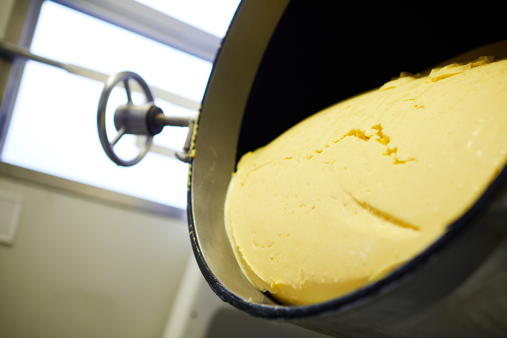 Sennerei Hittisau | Hittisau, Austria - July 29, 2019: Sennerei Hittisau; frische Butter in einem Kolding Biconical Mixer. - Realisiert mit Pictrs.com