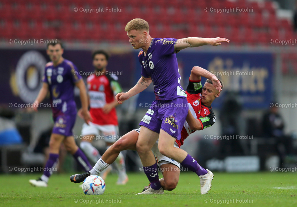 A_LUI_130822_0005 | SPORT,FUSSBALL,ADMIRAL BUNDESLIGA AUSTRIA KLAGENFURT-SV GUNTAMATIC RIED 14.08.2022 IM BILD: JONAS ARWEILER  (KLAGENFURT) UND MICHAEL MARTIN (RIED FOTO: FOTOLUI/MARIO WIMMER