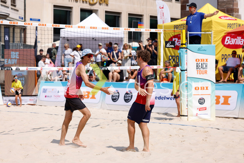 Obi BeachTour 2026 - Basel | BASEL, SWITZERLAND - JULY 19: SIMON HAGENBUCH (SUI) and YVES HAUSSENER (SUI) during the Obi BeachTour 2026 match between HAGENBUCH / HAUSSENER (SUI) and LEITNER / KINDL (AUT) at Barfüsserplatz on July 19, 2026 in Basel, Switzerland. - Realisiert mit Pictrs.com