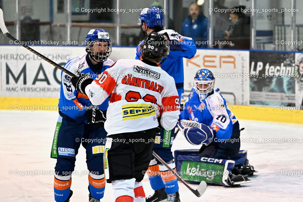 ESC SPARKASSE STEINDORF vs. EV ZELTWEG MURTAL LIONS | #70 Moser Lukas ESC Steindorf, #69 Kreuzer Philipp ESC Steindorf, #90 Bärnthaler Valentin EV ZELTWEG MURTAL LIONS, ESC SPARKASSE STEINDORF vs. EV ZELTWEG MURTAL LIONS, ESC SPARKASSE STEINDORF vs. EV ZELTWEG MURTAL LIONS am 27.12.2025 in Steindorf (Ossiachersee Halle), Austria, (Photo by Bernd Stefan)