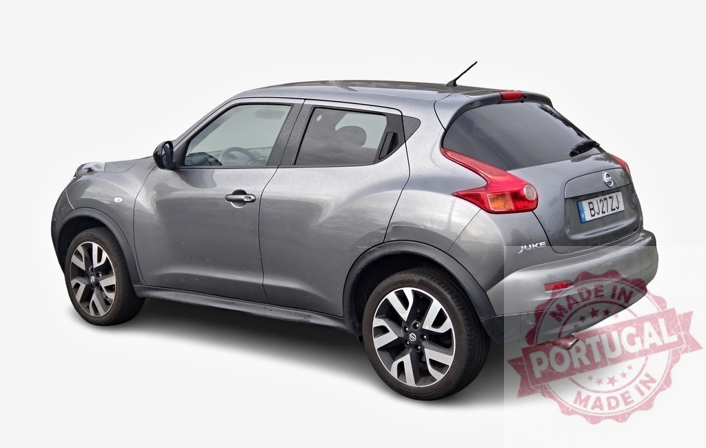 Nissan Juke compact crossover SUV car parked on white background | Modern gray Nissan Juke car parked on a white background, showcasing its design and features - Realized with Pictrs.com