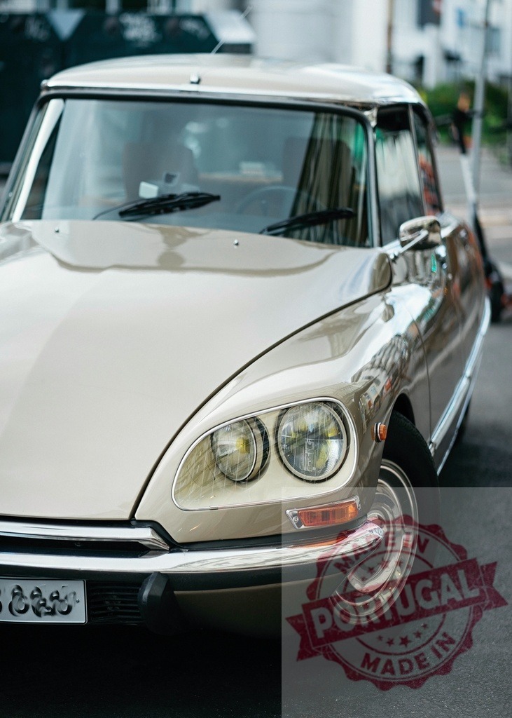 Citroën DS parked on the street reflecting urban life in its polished hood | Classic Citroën DS car parked on a city street, showcasing its iconic design and reflecting the surrounding urban environment - Realized with Pictrs.com