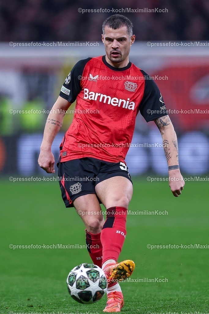 UCL11032502341 | 11.03.2025, Fußball, UEFA Champions League, Bayer 04 Leverkusen - FC Bayern München, Achtelfinale Rückspiel, BayArena, Saison 2024 2025: Granit Xhaka (Bayer04 Leverkusen #34)DFB regulations prohibit any use of photographs as image sequences and or quasi-video.
