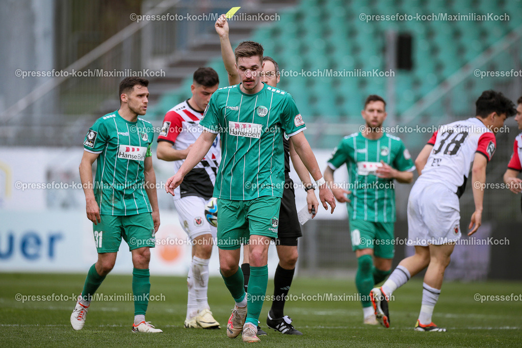 Koe3Liga31032402125 | 31.03.2024, Köln, Fußball, bwin 3. Liga Herren, Sportpark Höhenberg, 31. Spieltag, Saison 2023 2024, FC Viktoria Köln – VfB Lübeck: Gelbe Karte Sören Reddemann (VfB Lübeck). 
DFB regulations prohibit any use of photographs as image sequences and or quasi-video.