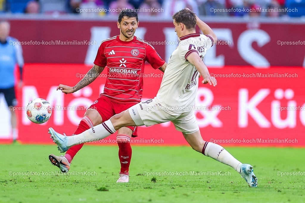 F9524042601043 | 24.04.2026, Fußball, Fortuna Düsseldorf - SC Dynamo Dresden, 2. Fußball Bundesliga, Herren, Merkur Spiel-Arena, 31. Spieltag, Saison 2025 2026: Matthias Zimmermann&nbsp;(Fortuna Düsseldorf #25) im Zweikampf gegen  Alexander Rossipal (Dynamo Dresden #19)  DFB regulations prohibit any use of photographs as image sequences and or quasi-video.
