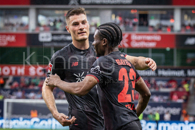 German Bundesliga, Bayer 04 Leverkusen vs. RB Leipzig, 02.05.2026 | LEVERKUSEN, GERMANY - MAY 2, 2026 :  Nathan Tella (Bayer 04 Leverkusen, 23) celebrates scoring his team's second goal with Patrik Schick (Bayer 04 Leverkusen, 14) during the German Bundesliga match on gameday 32 between Bayer 04 Leverkusen vs. RB Leipzig at BayArena on May 2, 2026 in Leverkusen, Germany. DFL REGULATIONS PROHIBIT ANY USE OF PHOTOGRAPHS AS IMAGE SEQUENCES AND/OR QUASI-VIDEO.