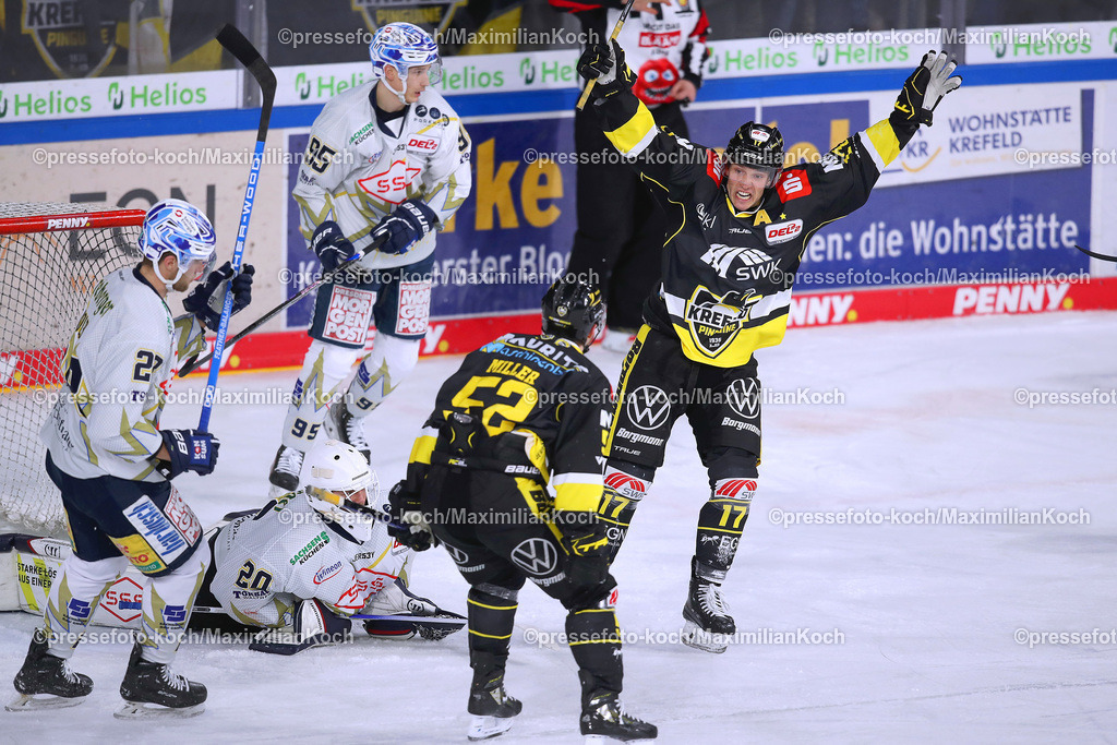 Kre2DEL15032301019 | Krefeld, 15.03.2023, Eishockey, DEL2, Viertelfinale, 1. Spiel, Playoffs, Yayla Arena, Krefeld Pinguine - Dresdner Eislöwen: Torjubel bei Leon Niederberger von Krefeld Pinguine jubelt nach dem 2:0 durch Mike Fischer von Krefeld Pinguine