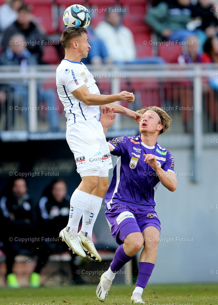 A_LUI_25022024_02 | SPORT,FUSSBALL, ADMIRAL BUNDESLIGA AUSTRIA KLAGENFURT - BLAU WEISS LINZ 25.02.2024 IM BILD :AARON SKY SCHWARZ (KLAGENFURT) UND TOBIAS KOCH (BLAUWEISSLINZ) FOTO:FOTOLUIMW
