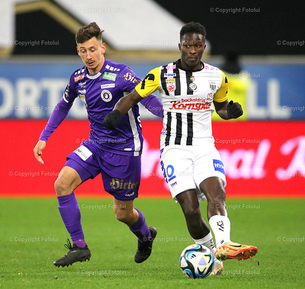 A_LUI_11022024_18 | SPORT,FUSSBALL ,ADMIRAL BUNDESLIGA 11.02.2024 LASK-AUSTRIA KLAGENFURT,IM BILD: MOUSSA KONE (LASK) UND TIL SEBASTIAN SCHUMACHER (KLAGENFURT) FOTO.FOTOLUI/MW