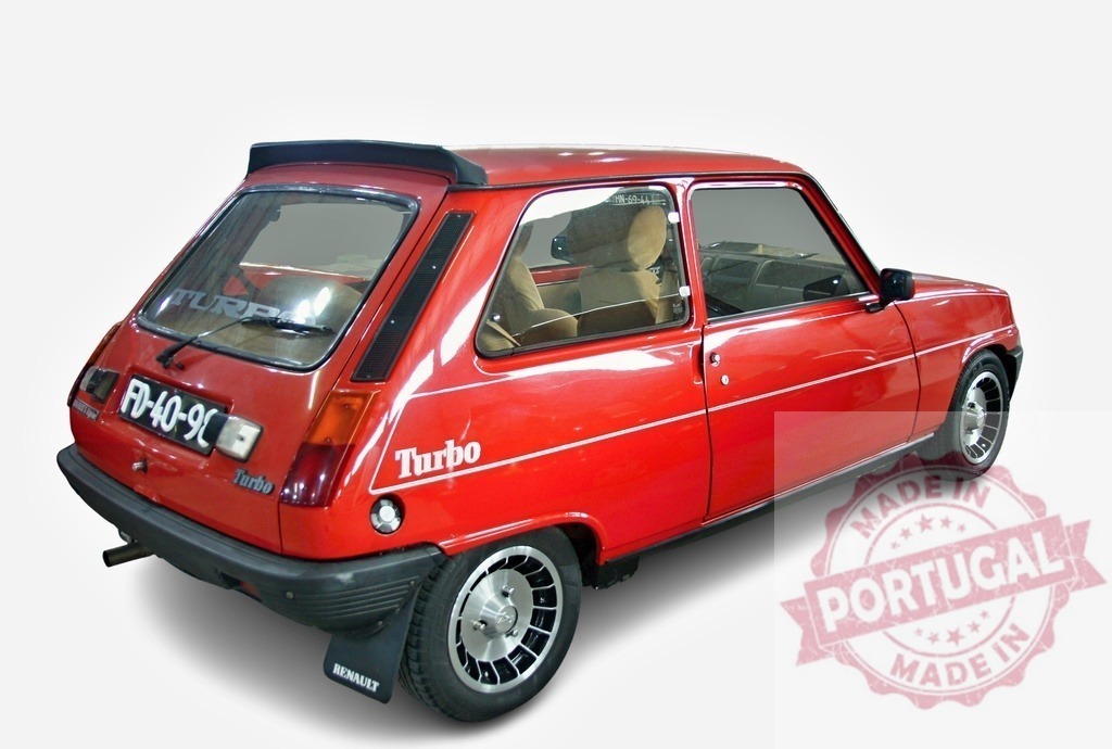 Red Renault 5 Turbo showcasing its sporty design in a studio setting | Red Renault 5 Turbo parked in a studio, highlighting its iconic design and turbocharged performance - Realized with Pictrs.com