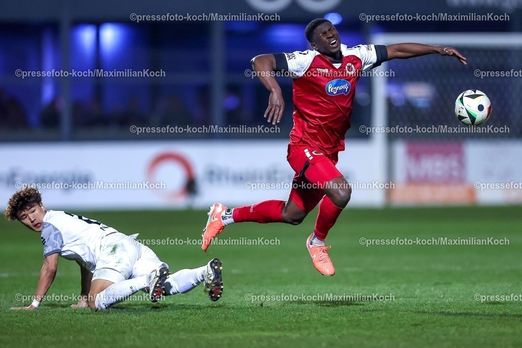 Koe12032501084 | 12.03.2025, Fußball, FC Viktoria Köln – Rot-Weiss Essen, 3.Liga, Sportpark Höhenberg, Saison 2024 2025: Kaito Mizuta (RWE #24) im Zweikampf gegen Zoumana Keita (Viktoria Köln #35)DFB regulations prohibit any use of photographs as image sequences and or quasi-video.