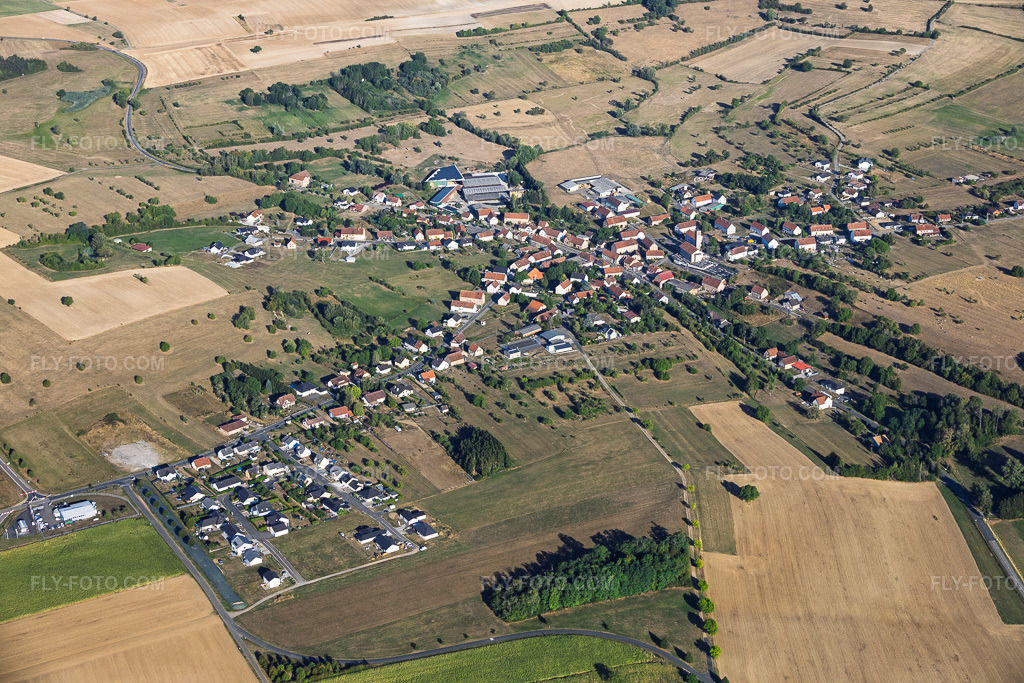 Aerial view: View of the town from the southeast in Epping in the state Moselle, France. – Photo: IMG_158730.jpg taken on 08/14/2026 by Werner Riehm/FLY-FOTO.com – Resolution of the original: 6000 x 4000 px