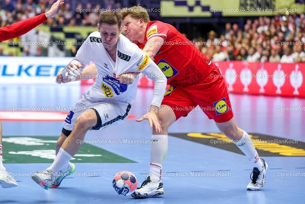 EHF19012601033 | 19.01.2026, Handball, Men's EHF EURO 2026, Österreich - Serbien, Jyske Bank Boxen in Herning, Dänemark, Preliminary Round:  Stefan Dodic (Serbien #40) im Zweikampf gegen   Lukas Hutecek (Austria #72) 