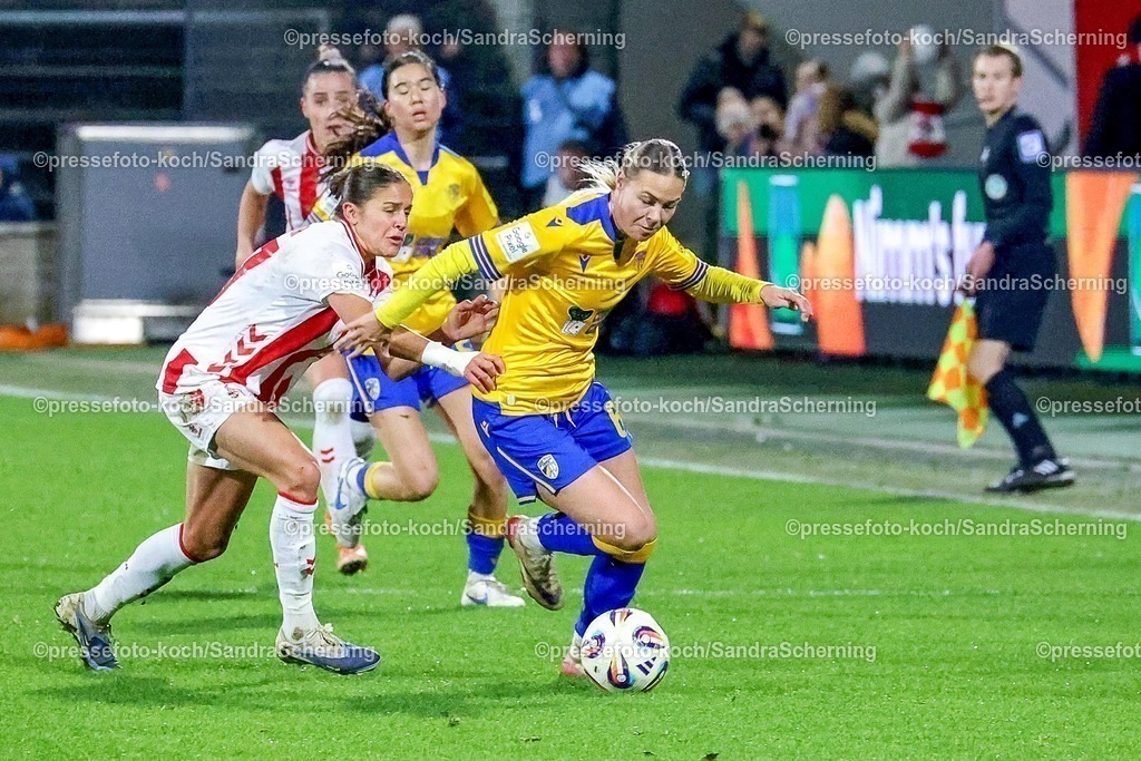 xSSCHx14122501031  | 14.12.2025, xsscx, Frauen Fussball, 1. FC Koeln - FC Carl Zeiss Jena, 1. Fussball Bundesliga, 13. Spieltag, Franz-Kremer-Stadion, Saison 2025 2026: Laura Feiersinger (1. FC Koeln #27) im Zweikampf gegen Nike Andersson (FC Carl Zeiss Jena #6) DFB regulations prohibit any use of photographs as image sequences and or quasi-video. Photo:xSandraxScherningxPressefotoKochx