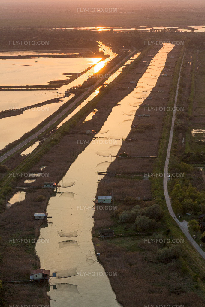 Aerial view: Fishing nets along the breakwater on the Adriatic coast in Marina Romea, Emilia-Romagna in Ravenna in the state Ravenna, Italy. – Photo: IMG_098541.jpg taken on 04/05/2017 by Werner Riehm/FLY-FOTO.com – Resolution of the original: 3648 x 5472 px