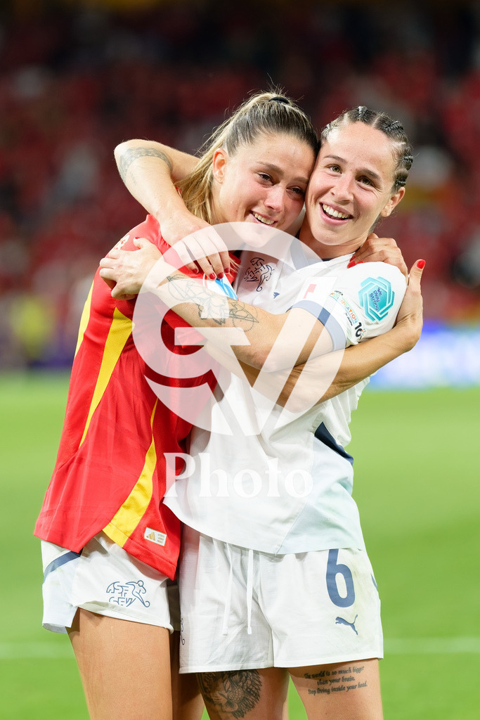 Spain v Switzerland - UEFA Women's EURO 2025 Quarter-Final | BERN, SWITZERLAND - JULY 18: Viola Calligaris  of Switzerland (L) and Geraldine Reuteler of Switzerland (R) smiles during the UEFA Women's EURO 2025 Quarter-Final match between Spain v Switzerland at Stadion Wankdorf on July 18, 2025 in Bern, Switzerland. (Photo by Giuseppe Velletri/Sports Press Photo/Getty Images)