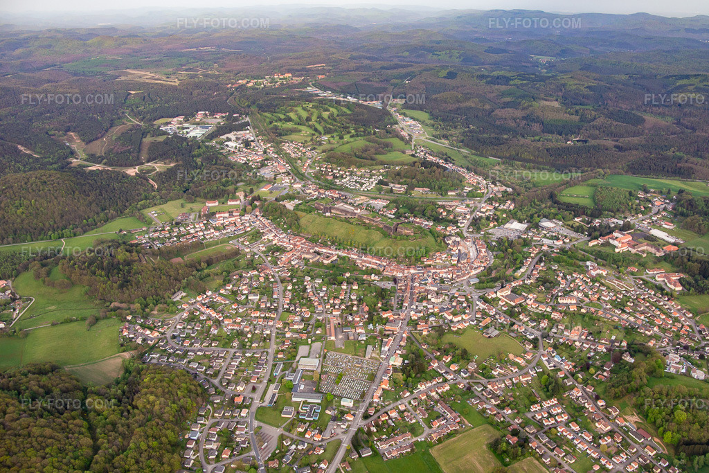 Aerial view: View of the town from the west in Bitsch in the state Moselle, France. – Photo: IMG_140442.jpg taken on 04/30/2024 by Werner Riehm/FLY-FOTO.com – Resolution of the original: 4795 x 3197 px