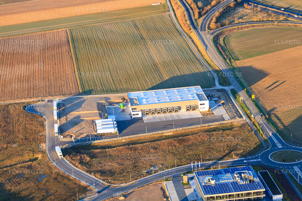 Luftbild: TRANSAC Intern. Speditionsgesellschaft mbH im Gewerbegebiet Im Speyerer Tal in Rülzheim im Bundesland Rheinland-Pfalz in Deutschland. – Foto: IMG_62269.jpg vom 23.02.2014 durch Werner Riehm/FLY-FOTO.de – Auflösung des Originals: 4752 x 3168 px – TRANSAC Logistics GmbH
