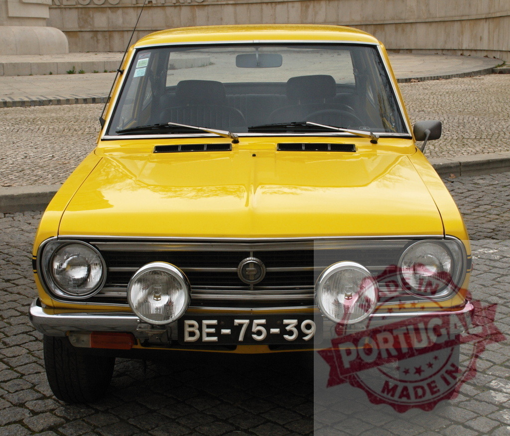Yellow Datsun 1200 Sunny parked on cobblestone street | Classic yellow Datsun 1200 Sunny parked on a cobblestone street, showcasing its vintage charm - Realized with Pictrs.com