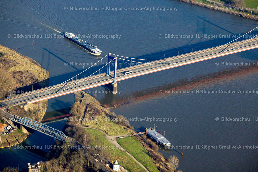 Luftbild Duisburg-8760 | Luftbildfotografie Friedrich-Ebert-Brücke über den Rhein am Hafen entlang der Rheindeichstraße - Dammstraße in Duisburg im Bundesland Nordrhein-Westfalen - Realisiert mit Pictrs.com