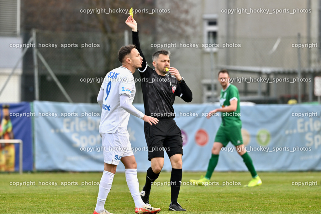 SAK vs. VST Völkermarkt | #9 Sinan Samardzic SAK, Michael Terbul Referee, Gelbe Karte, SAK vs. VST Völkermarkt, SAK vs. VST Völkermarkt am 21.03.2026 in Klagenfurt (Sportpark Welzenegg), Austria, (Photo by Bernd Stefan)