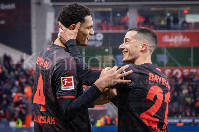 Bayer 04 Leverkusen vs. FC St. Pauli, 14.02.2026 | LEVERKUSEN, GERMANY - FEBRUARY 14:  Jarell Quansah (Bayer 04 Leverkusen, 4) celebrates scoring his team's first goal with Lucas Vazquez (Bayer 04 Leverkusen, 21) during the Bundesliga match (gameday 22)  between Bayer 04 Leverkusen vs. FC St. Pauli at BayArena on February 14, 2026 in Leverkusen, Germany. (Photo by Axel Kohring/Beautiful Sports Int.)DFL REGULATIONS PROHIBIT ANY USE OF PHOTOGRAPHS AS IMAGE SEQUENCES AND/OR QUASI-VIDEO.