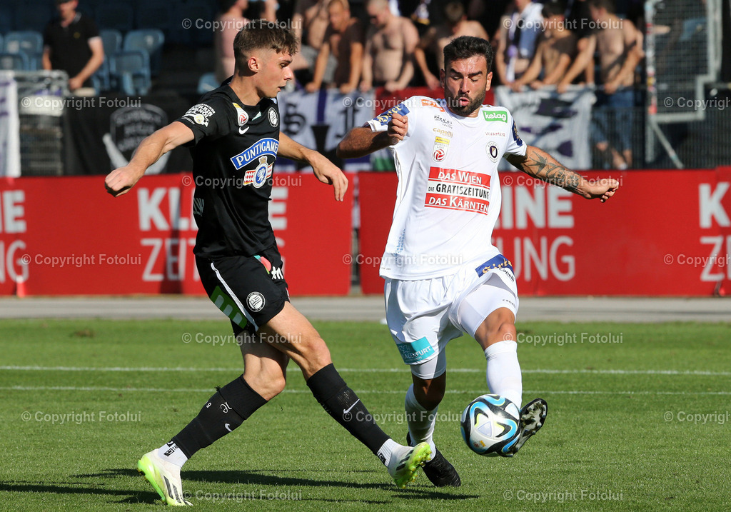 A_LUI_120823_0012 | SPORT,FUSSBALL,ADMIRAL BUNDESLIGA STURM GRAZ-AUSTRIA KLAGENFURT IM BILD:LEON GRGIC (STURM GRAZ) UND KOSMAS GKEZOS (KLAGENFURT) FOTOLUI/MW