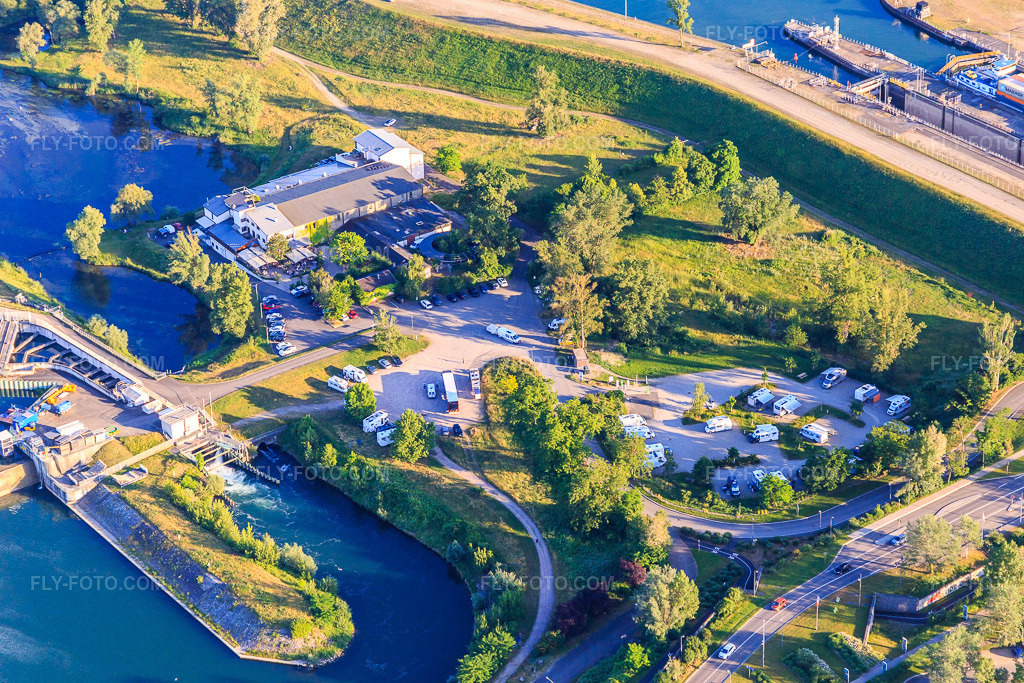 Aerial view: Campingcar Park and Hotel Le Caballin in Vogelgrun in the state Haut-Rhin, France.Photo: IMG_147830.jpg taken on 05/30/2025 by Werner Riehm/FLY-FOTO.comResolution of the original: 5472 x 3648 pxWWW.CAMPINGCARPARK.COM