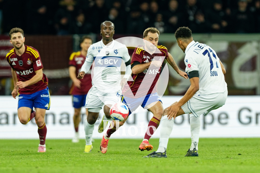 Brack Super League - Servette FC v FC Lausanne-Sport | Timothe Cognat (8 Servette FC) in action (close up) under pressure of Karim Sow (71 FC Lausanne-Sport)  during the Brack Super League match between Servette FC and FC Lausanne-Sport at Stade de Geneve in Geneva, Switzerland