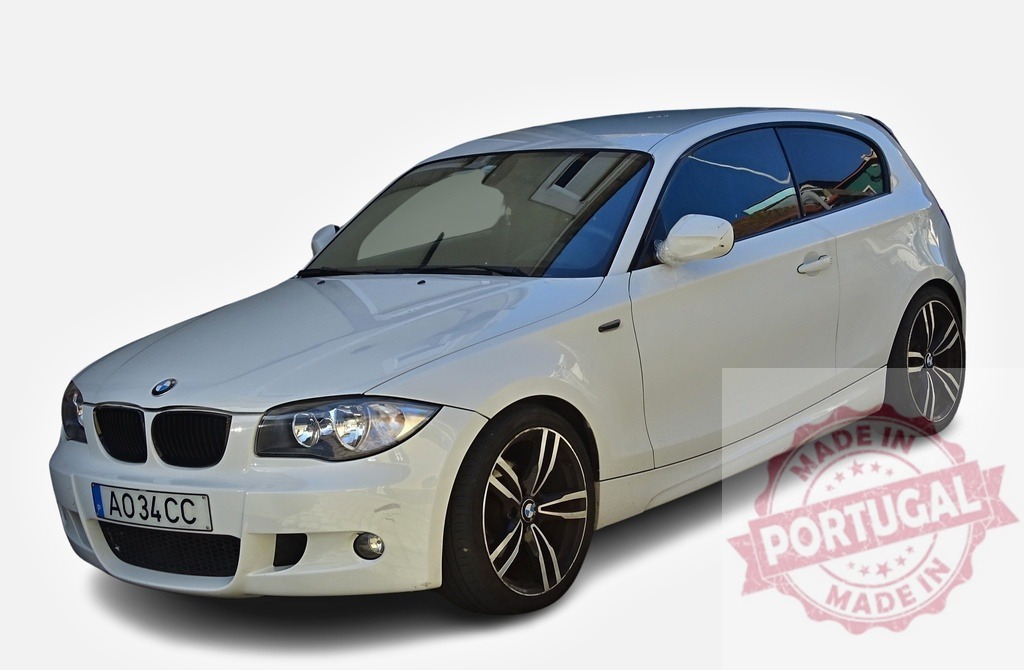 White BMW 1 Series Hatchback Parked on White Background | Stylish white BMW 1 Series hatchback parked, showcasing its sleek design and sporty features - Realisiert mit Pictrs.com